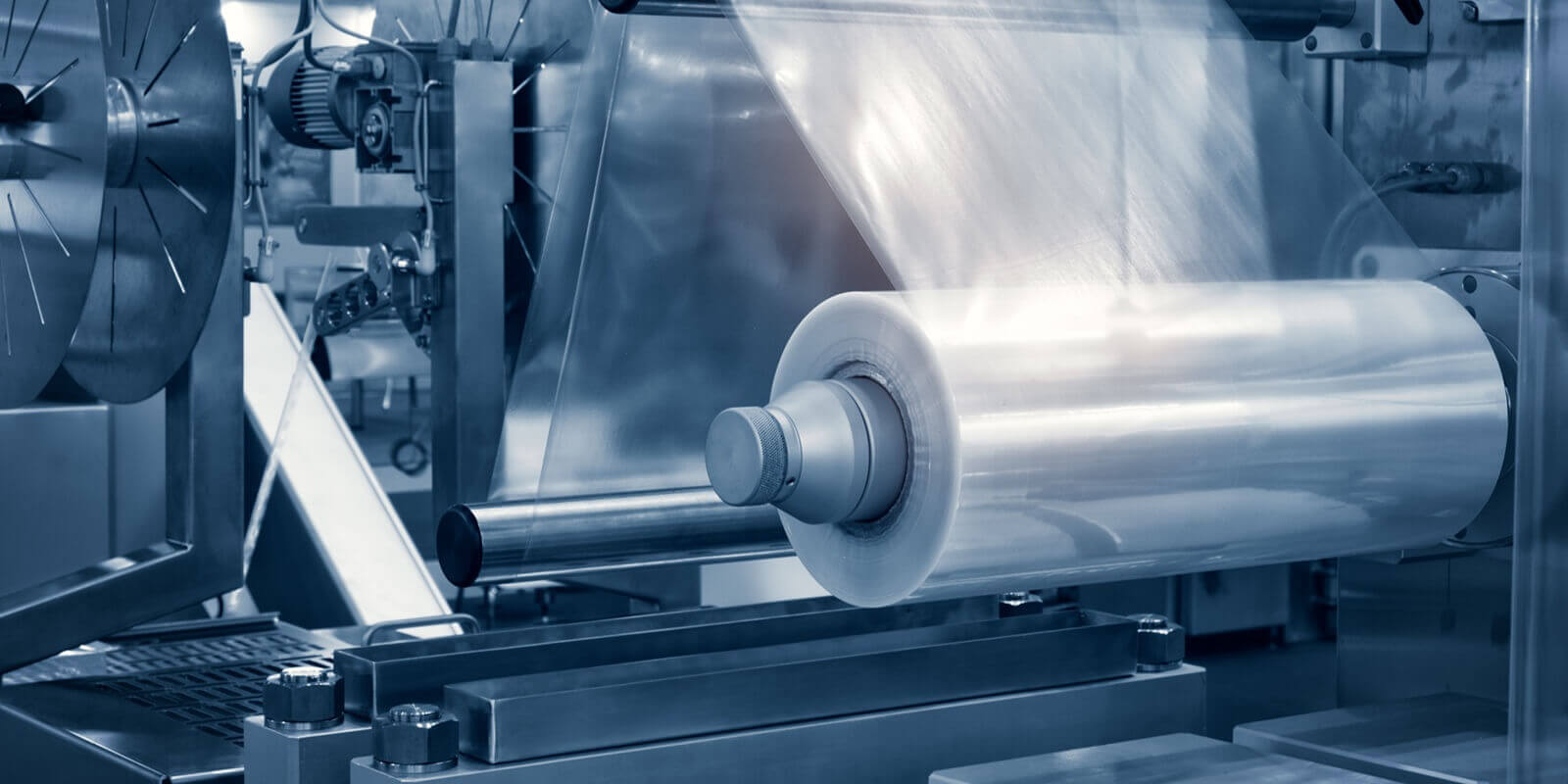 operation of automatic plastic bag production machine with lighting effect
