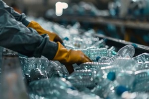 close-up of gloved hands sorting plastic bottles on a conveyor a testament to the dedication in recycling efforts