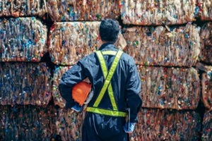 engineer standing and looking back The plastic bottle in the recycling industry