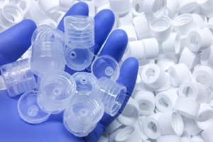 white medical plastic bottle caps