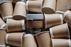 Brown and White Bio Polymer Cups for plastic sustainability