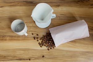 Coffee Beans Coming Out From Bioplastic Pouch