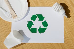 Paper Cup Plate Fork Light Bulb and Recycling Symbol