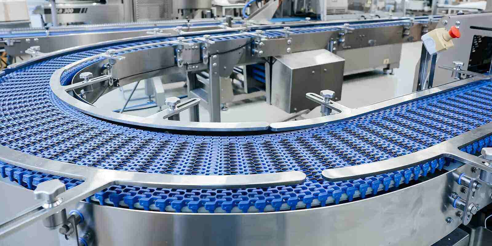 modern conveyor belt of production line, part of industrial equipment in factory plant