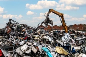 a scrapyard with a pile of scrap metal