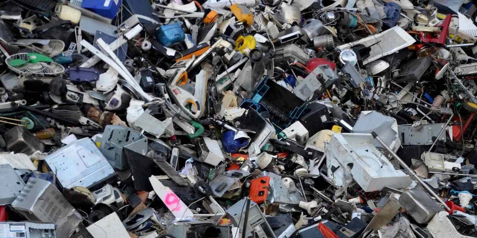 full-frame shot of disorganized pile of discarded electronic waste e-waste